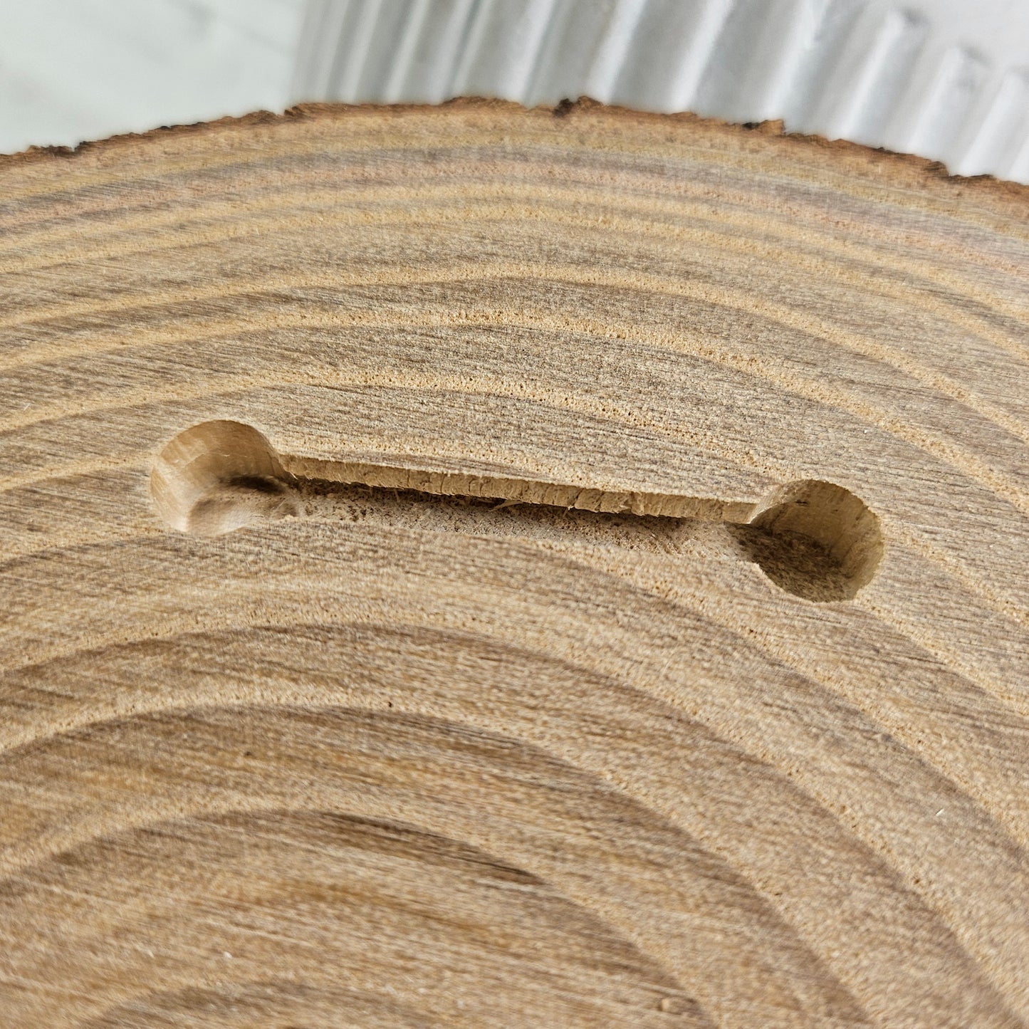 The Slice of Scripture easy keyhole hanging system - light enough to hang in drywall with only a pushpin.
