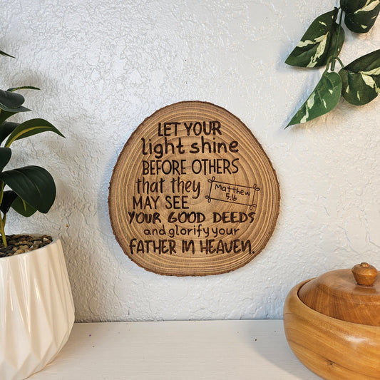 9 inch wood Slice of Scripture piece of Bible verse wall art displaying Matthew 5:16 - Christian decorative art home decor