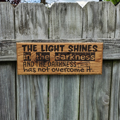 14 inch wood Slice of Scripture reclaimed pallet wood Bible verse wall art displaying John 1:5 - Christian decorative art home decor